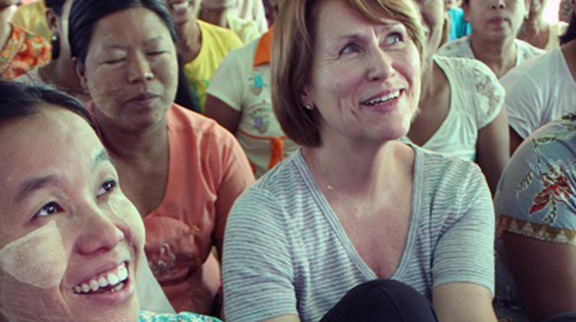  UNOPS Executive Director, Ms. Grete Faremo chats with clients from Pact Global Microfinance (PGMF)  Photo:  B. Guillemot /UNOPS